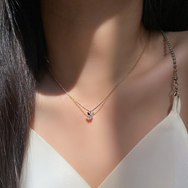 Wholesale alloy clavicle chain fashion jewelry - european & american style, versatile, diamond-studded pendant, delicate butterfly necklace for women