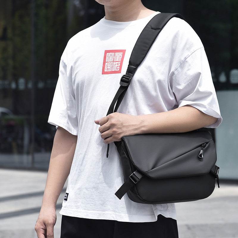Cross-border new men's large-capacity casual bag, outdoor sports fashion leather film, shoulder messenger bag, one piece will be sent on behalf of others.