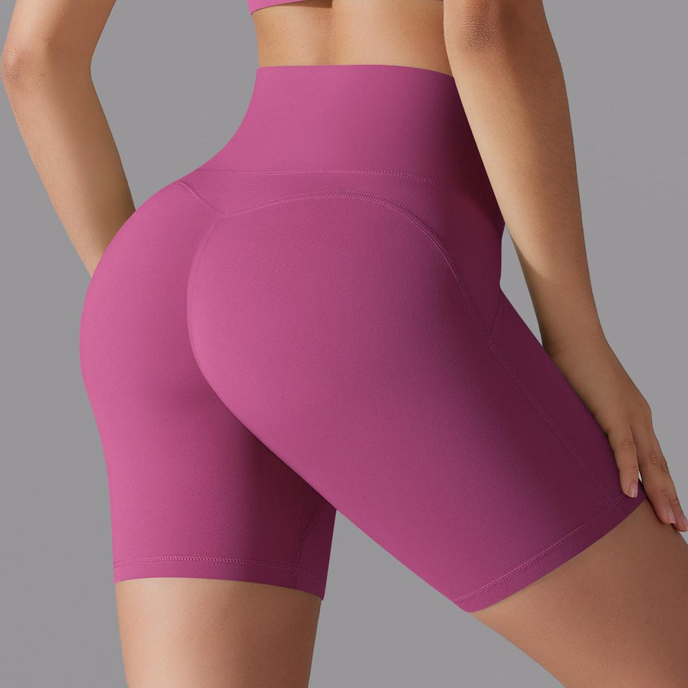 Naked-feel, high-waisted, butt-lifting yoga shorts – perfect for running, fitness, and a custom-made, three-quarter length fit. sampling and oem manufacturing available