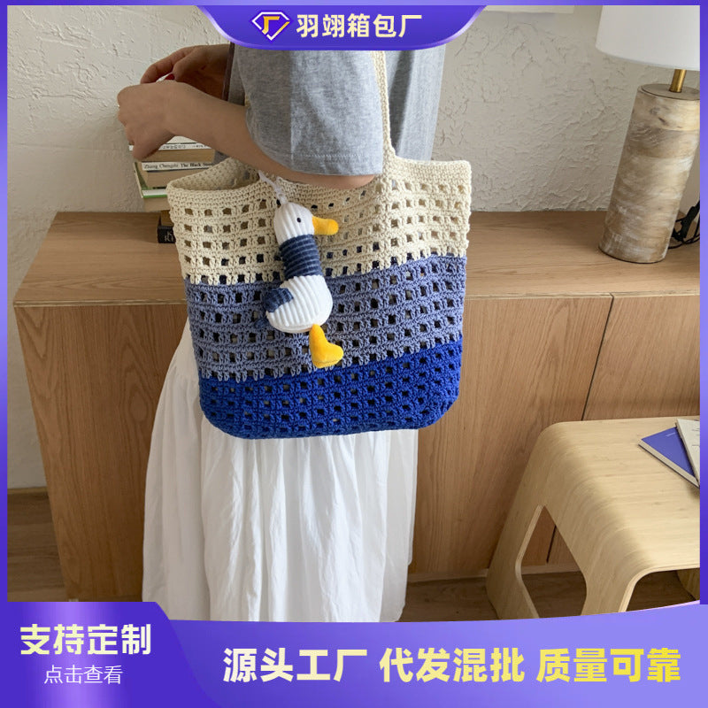 Cross-border 2025 new simple large-capacity woven bag women's wool crocheted hollow shoulder bag gift vacation beach bag