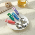 Cartoon dinosaur stainless steel cutlery set - anti-scald handles, forks & spoons, multiple colors available, wholesale children's western dinnerware