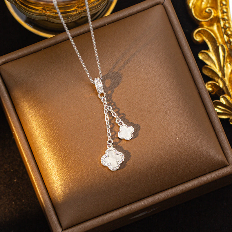 Copper inlaid zirconium four-leaf clover necklace for women, titanium steel real gold plating popularinsfashion flower exquisite sweater chain jewelry