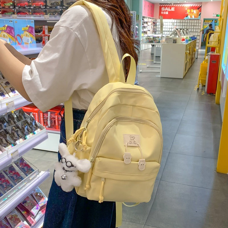 School bag female college student Korean version ins solid color simple and versatile junior high school student travel small backpack high school student backpack