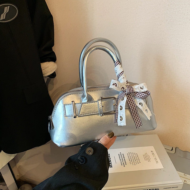 Dopamine girl hand shell bag 2025 spring and summer new Korean version shoulder bag fashion niche casual shoulder bag