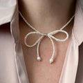 Bow choker necklace female fashion elegantsweet imitation pearl string chain niche styleclassy fairy style necklace