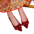 Red wedding shoes women's flats 2022 new chinese style bridal shoes bowknot maternity wearable xiuhe wedding dress two-wear