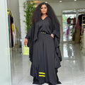 African-inspired loose fit batwing sleeve top and color block striped wide leg pants two-piece set