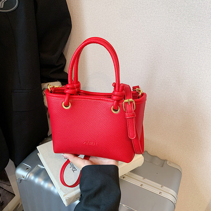 Foreign trade advanced sense hand carrying bucket bag 2025 summer simple and versatile shoulder bag trendy niche design messenger bag