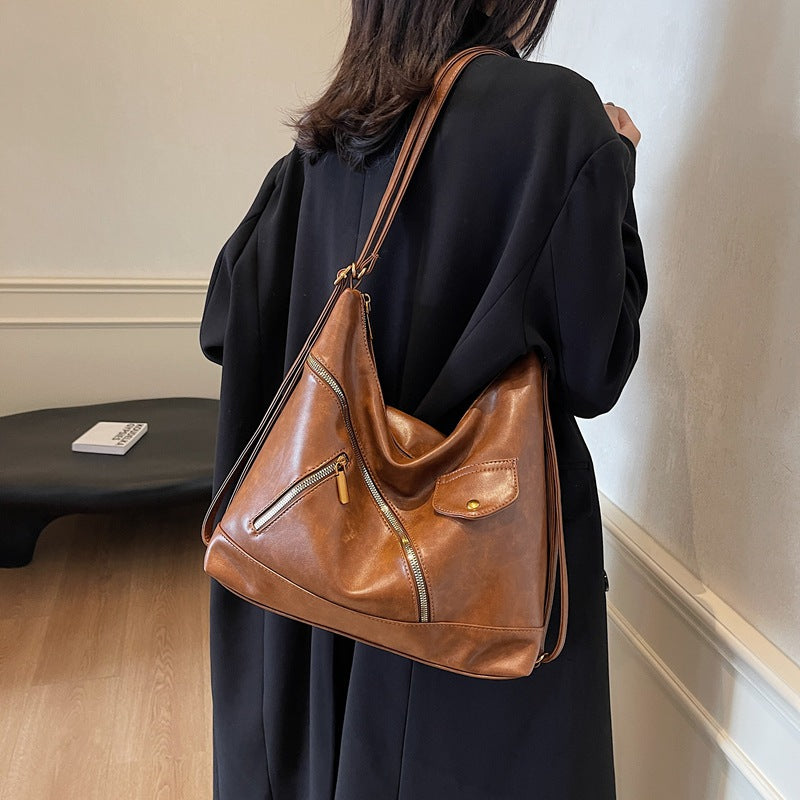 Retro fashion Spice Girl locomotive bag 2025 autumn and winter new shoulder women's bag soft leather messenger bag commuter tote bag