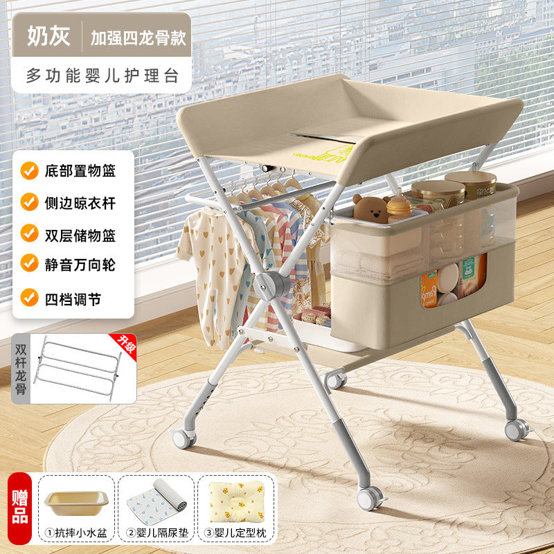 Baby changing table - newborn diaper changing, bathing, massage, and bed - foldable multifunctional baby bed