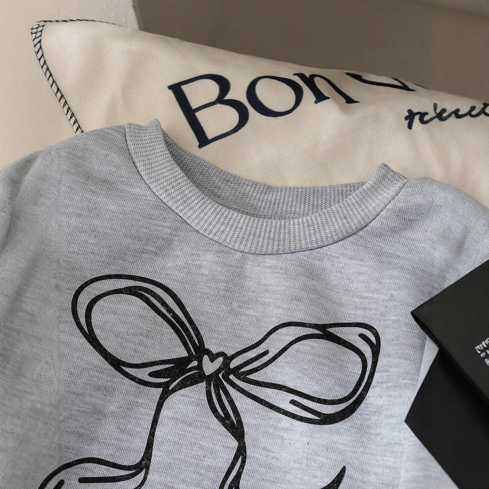 Spring/summer girls' versatile sweatshirt with bow print detail, long sleeve top + solid black pants