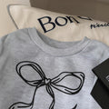 Spring/summer girls' versatile sweatshirt with bow print detail, long sleeve top + solid black pants