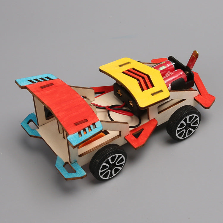 Science and technology small production creative electric wooden racing students invent and assemble scientific experimental toys handmade materials