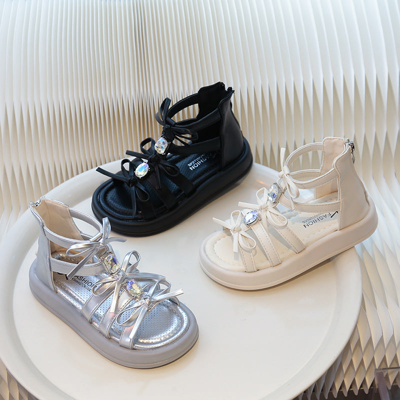 Children's Roman sandals 2025 summer new Korean version girls rhinestone bow princess shoes soft-soled beach shoes