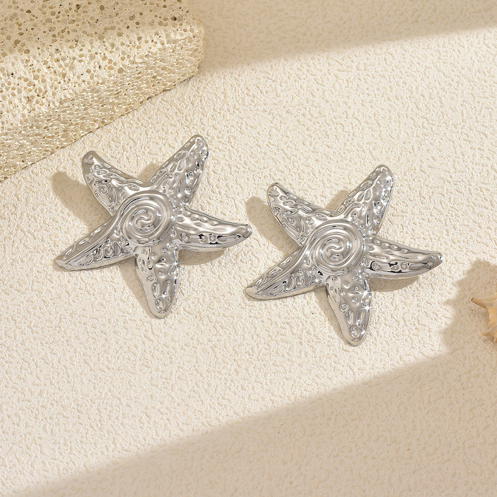 Wholesale seaside earrings: cross-border summer ocean resort style alloy starfish earrings for women - european and american niche exaggerated dangle earrings