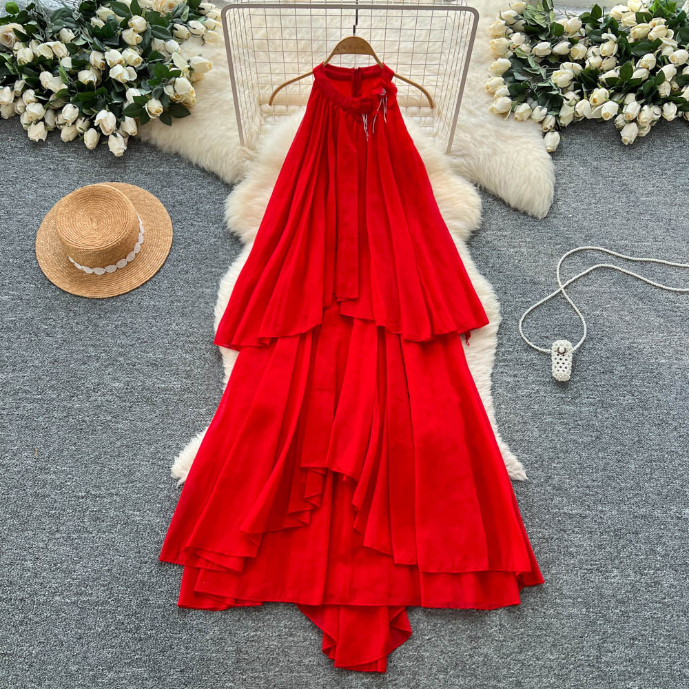 French-inspired, three-dimensional floral halter neck sleeveless dress for women. loose-fitting, slimming, casual, and featuring an asymmetrical hem in a vibrant red