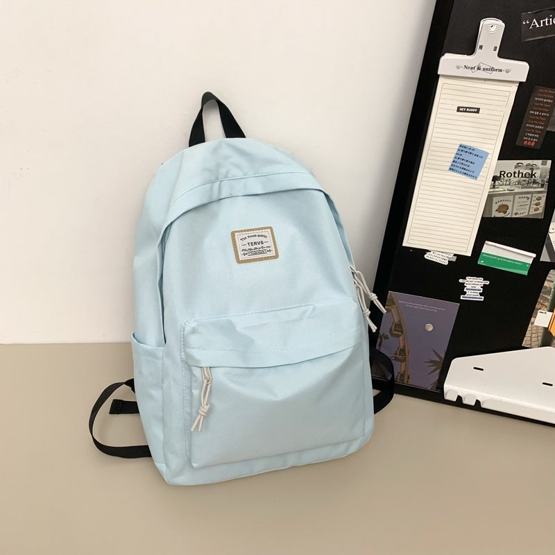 New fashion simple trend backpack large capacity lightweight travel backpack Korean version of junior high school student schoolbag