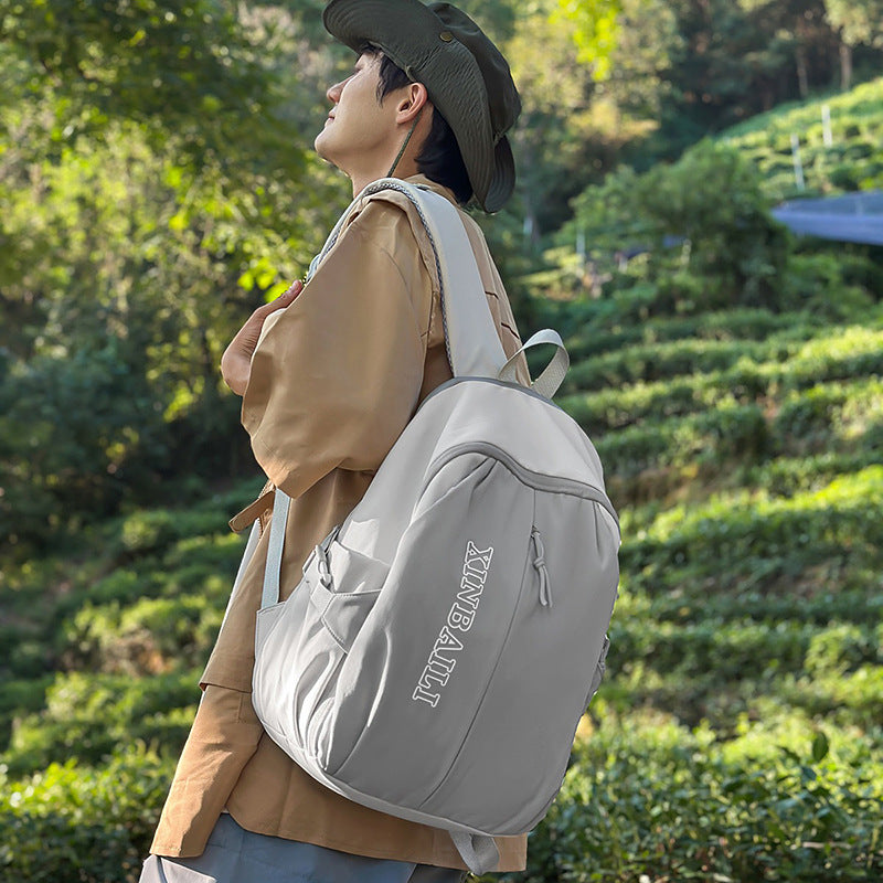 Outdoor schoolbag male large capacity junior high school student middle school student fashion trend simple backpack female style travel bag