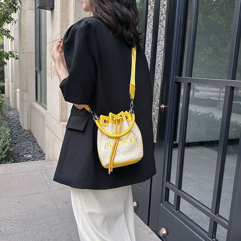 Woven handbag small bag women's new straw bucket bag summer popular niche style shoulder crossbody bag cylinder