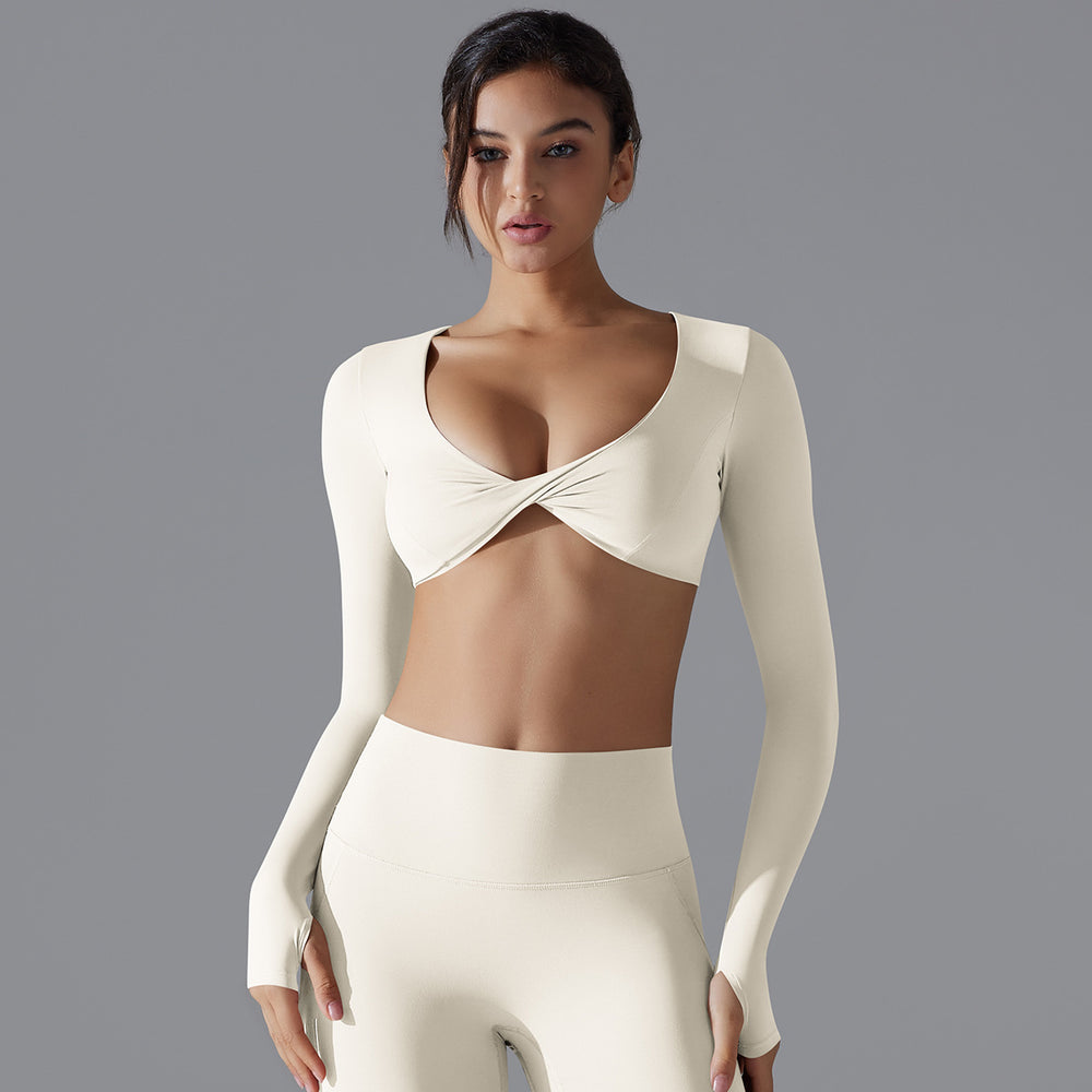 New women's activewear long sleeve top: deep v-neck, slim fit, breathable, trendy cropped yoga top for outdoor workouts