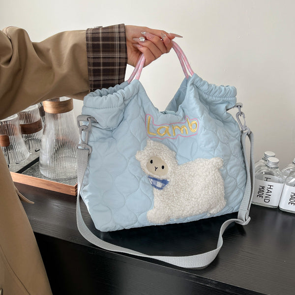Korean version of cute embroidery pattern drawstring shoulder bag simple and versatile adjustable messenger bag college style commuter bag