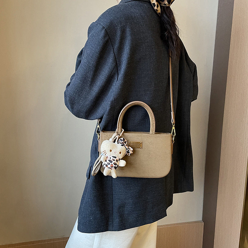 Frosted box bag, hand carry small bag, women's 2025 new autumn and winter retro suede messenger bag, mobile phone bag.