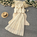 Elegant and chic chanel-inspired two-piece set: women's autumn outfit featuring a tie-waist cardigan and mesh skirt