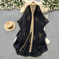 French-style, heavily embellished beaded v-neck hooded dress for women, perfect for spring. features a wine-red, asymmetrical hemline, exuding a sophisticated and elegant vibe