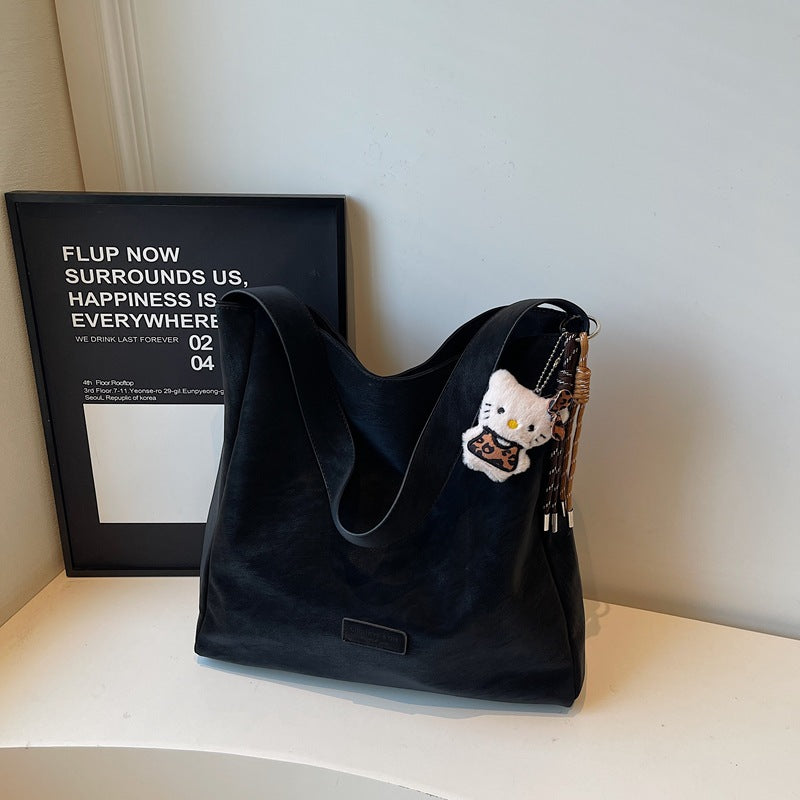 Large capacity retro handbag for women, trendy 2025 new arrival, minimalist versatile soft shoulder bag, high-end commuter tote bag