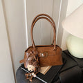 Korean style niche versatile shell bag for women - autumn 2025 retro work commute shoulder bag - high-end handbag