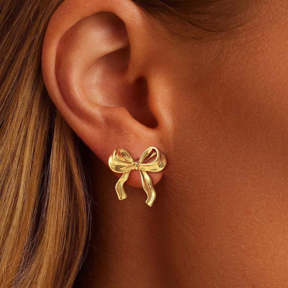 Amazon cross-border fashion light luxury gold-plated copper stud earrings, gold bow earrings, high-end women's jewelry wholesale