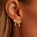 Amazon cross-border fashion light luxury gold-plated copper stud earrings, gold bow earrings, high-end women's jewelry wholesale
