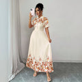 european and american new retro orange blossom patchwork shirt dress with turn-down collar, short sleeves, cinched waist, and long pleated skirt